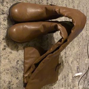 Thigh-high brown leather boots